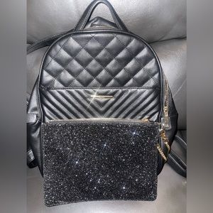 Black leather Aldo backpack with Detachable Wristlet